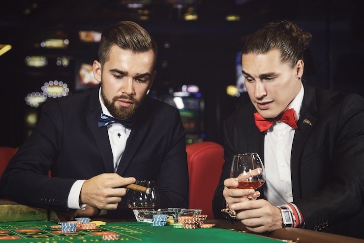 Antarmuka aplikasi mobile zeintoto menampilkan koleksi permainan slot dan opsi sportsbook